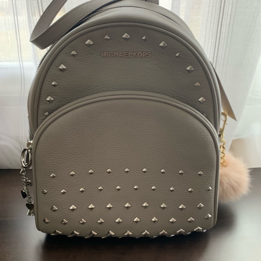 Michael Kors backpack W/auth charms